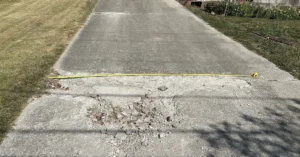 concrete driveway surface damage